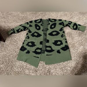 In used condition army green cardigan
